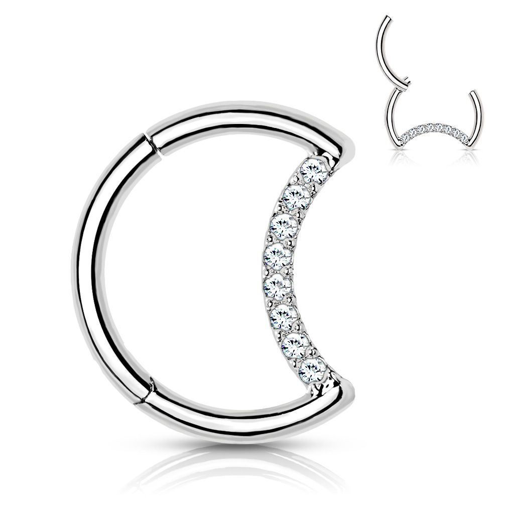 Ring made of titanium with stone-paved crescent